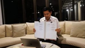 Bupati Joune Ganda Sampaikan RPJMD 2021-2026 di Rapat Paripurna DPRD Minut Via Zoom Metting