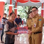 Bupati Joune Ganda Serahkan Bantuan Dana Duka Untuk 390 Ahli Waris