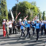Sambut HUT Ke-17 Kotamobagu, Wali Kota Asripan Nani Lepas Ribuan Peserta Lomba Gerak Jalan