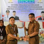 Abdullah Mokoginta Launching Uji Coba Implementasi Kebijakan Pelayanan Administrasi Kependudukan