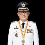 Bupati Minut Joune Ganda akan Terima Penghargaan UHC