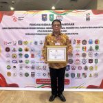 Pj Wali Kota Abdullah Mokoginta Terima Penghargaan dari Kemendagri RI