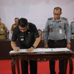 Abdullah Mokoginta Tandatangani Nota Kesepakatan dan Rencana Kerja Antara Pemkot Kotamobagu dengan Kemenkuham Sulut