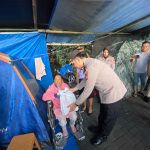 Kapolres Minahasa Turun Langsung Salurkan Bantuan kepada Warga Terdampak Banjir