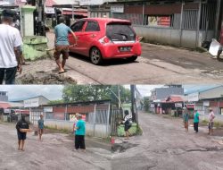 Tak Kunjung Diperbaiki, Warga Girian Bawah Tambal Jalan Berlubang Secara Swadaya