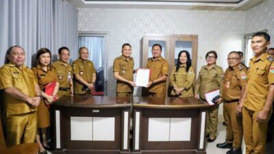 Bupati Mitra Ronald Kandoli Tanda Tangani SK Dana Hibah KONI