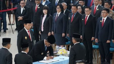 Bupati Joune Ganda Hadiri Pelantikan Tahlis Gallang sebagai Sekprov Sulut