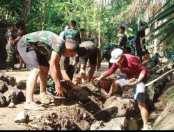 Satgas TMMD ke-128 Kodim 1302/Minahasa Kebut Pengecoran Talut Jalan di Watuliney