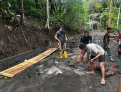 Satgas TMMD Ke-128 Kodim 1302/Minahasa Genjot Pengerasan Jalan dan Pemasangan Talud di Watuliney