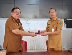 Sertijab, Estafet Kepemimpinan Diskominfosan Minut dari Robby Parengkuan ke Styvi Watupongoh